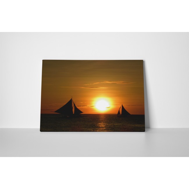 Vitorlázás a naplementében