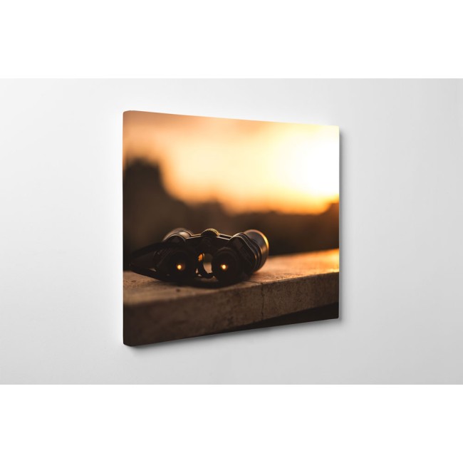 Távcső a napnyugtában